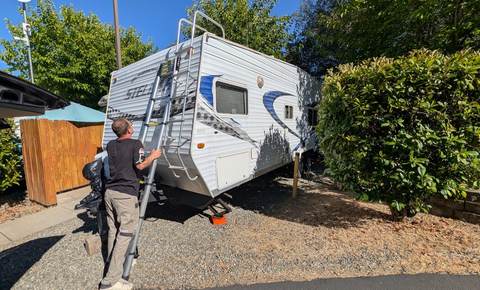 Travel trailer roof access service