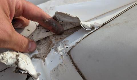 RV roof seal repair close-up